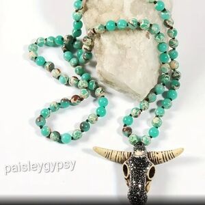 Turquoise Colored Beaded Necklace with Bull Skull Pendant